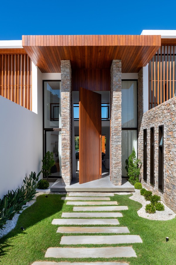 O Impacto Visual de um Puxador Bem Escolhido em Portas Largas - inspiração 2