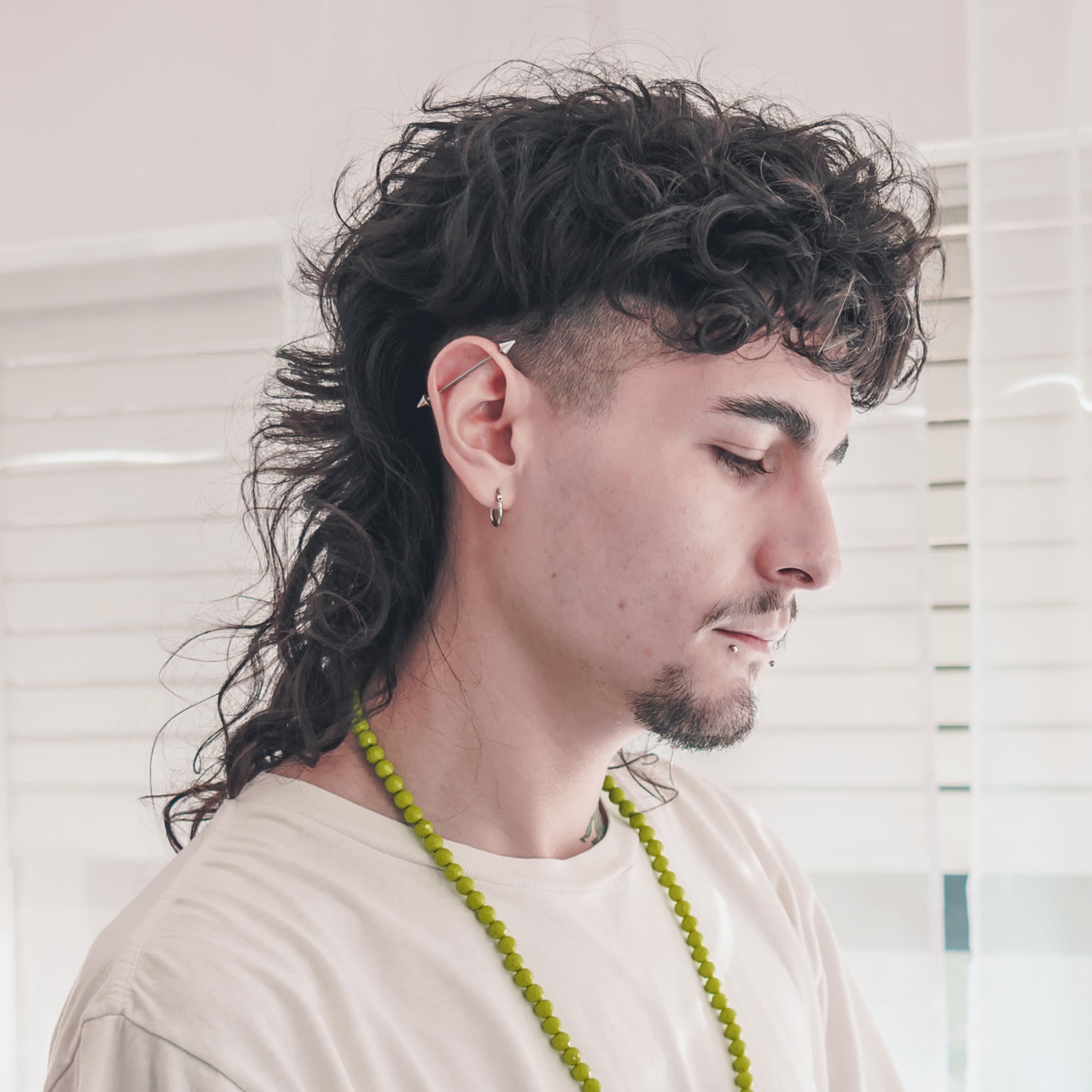corte de cabelo cachos masculino