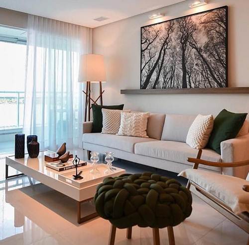 decoração de sala de tv com tapete grande