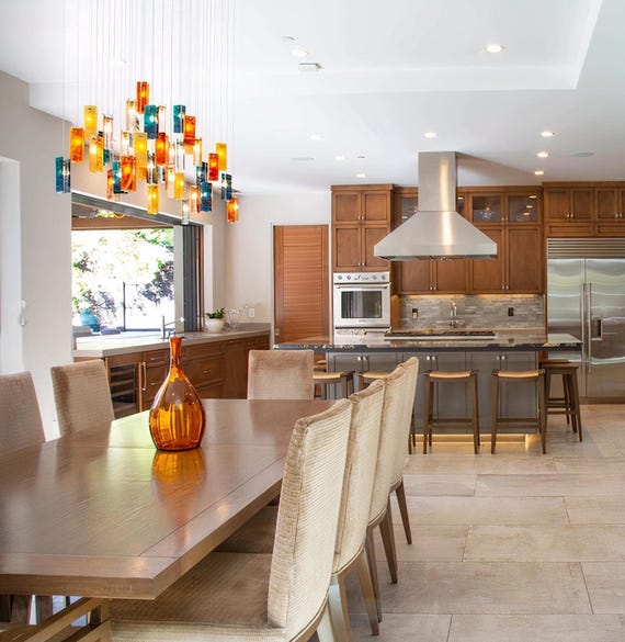 Tendências de Lustres para Mesas Quadradas em 2026